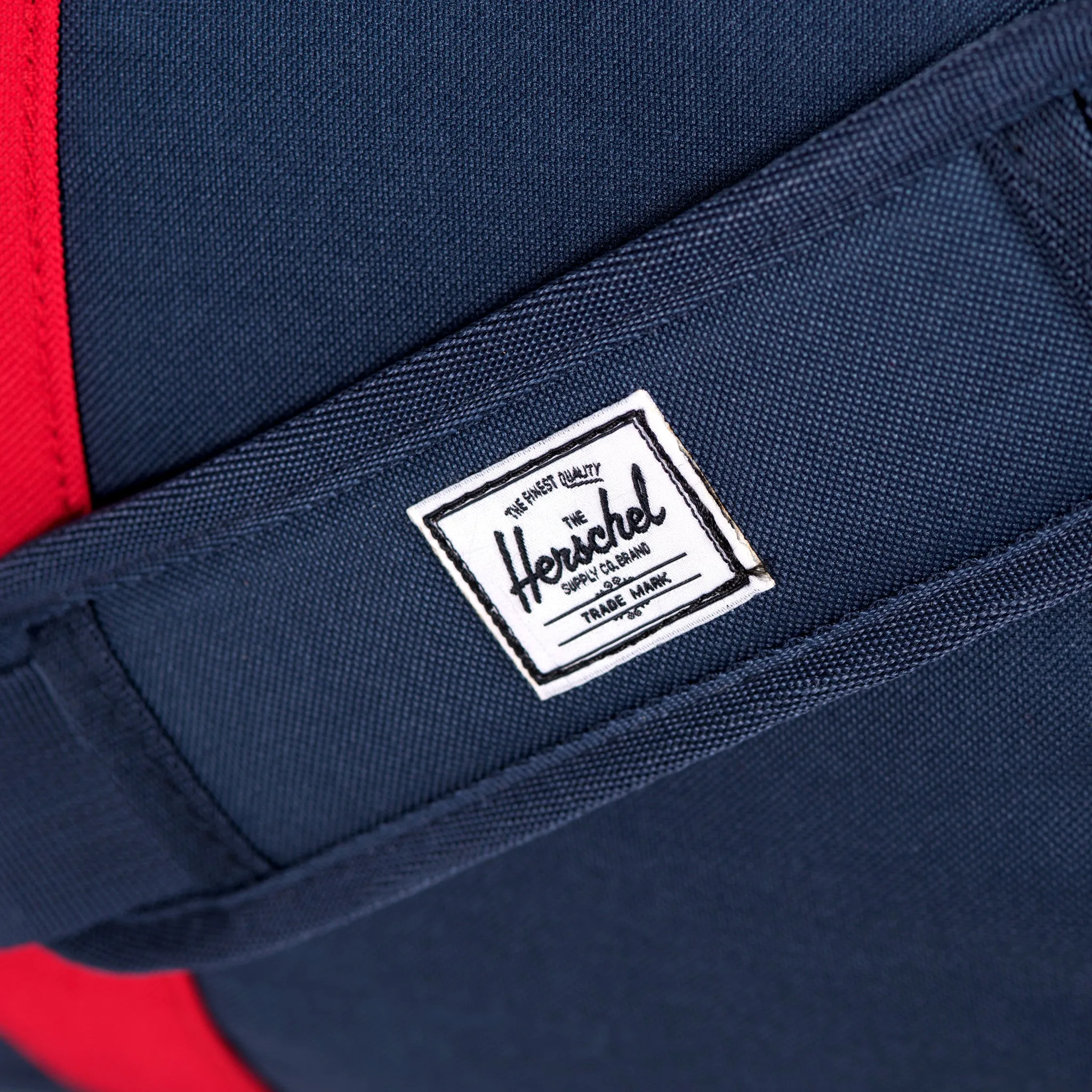 Herschel Supply Novel Duffel Bag - Woodland Camo / Navy / Red