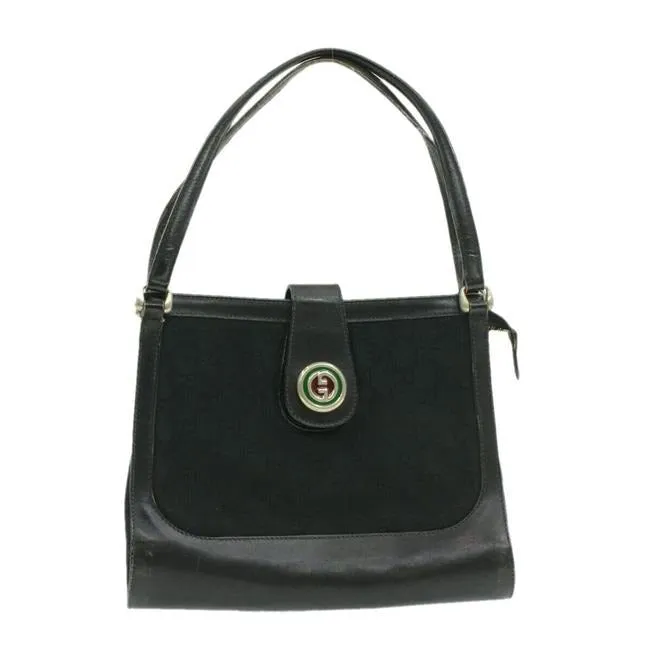 Rare, GUCCI, black Guccissima print satchel/tote bag w/ a 1973 style, round, red and green enamel GG logo snap!