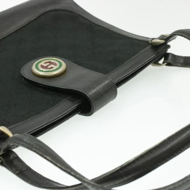 Rare, GUCCI, black Guccissima print satchel/tote bag w/ a 1973 style, round, red and green enamel GG logo snap!